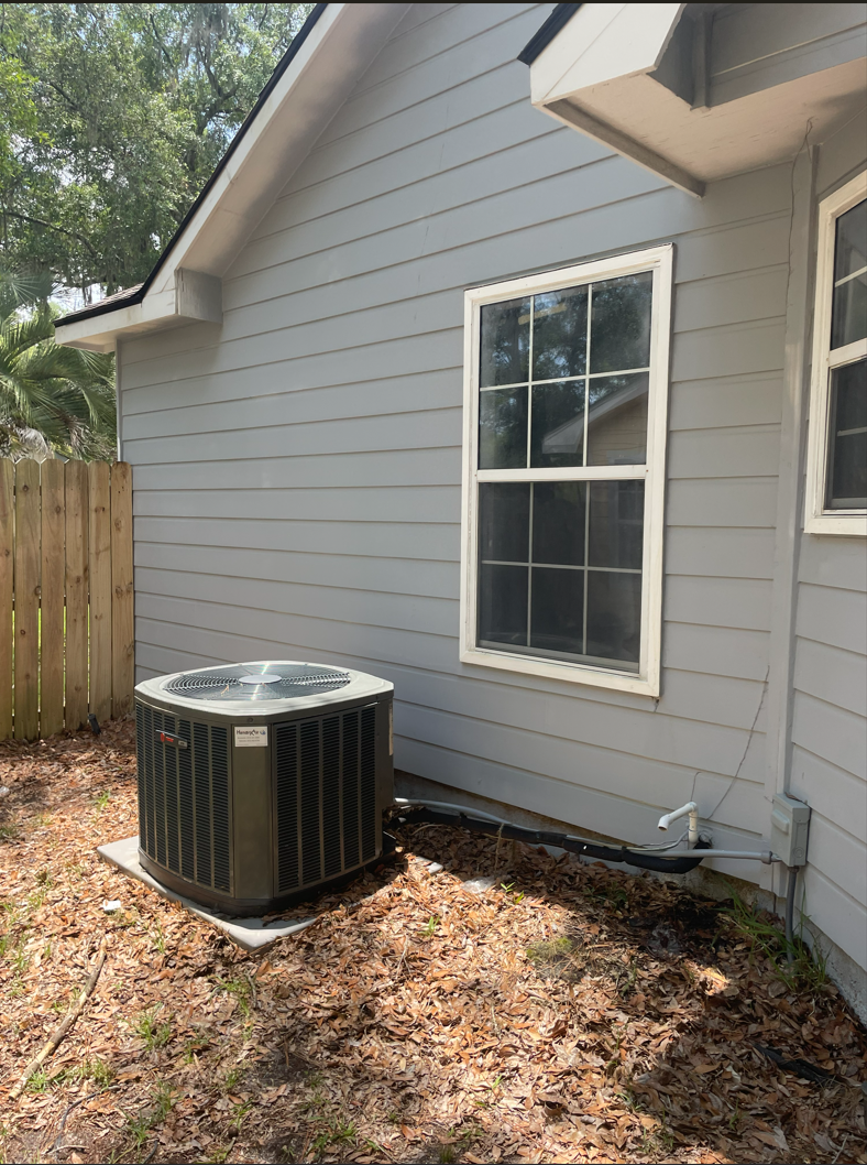 House siding after soft washing with a cleaner exterior finish